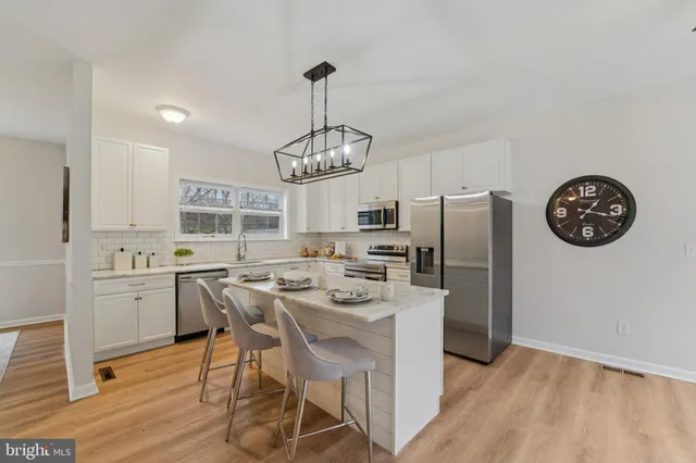 a large kitchen with cabinets