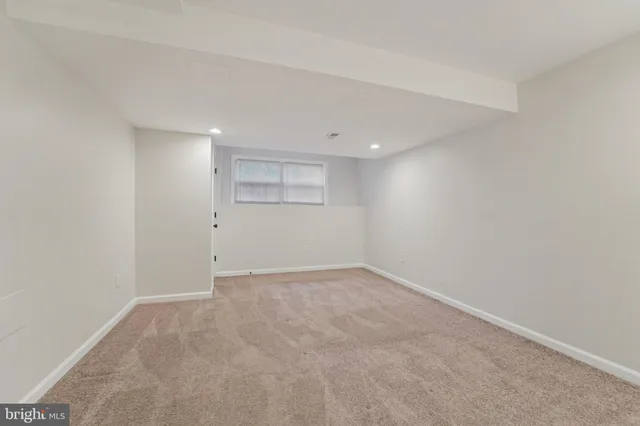 a view of balcony with wooden floor and fence