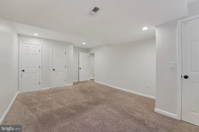 a view of a balcony with wooden floor