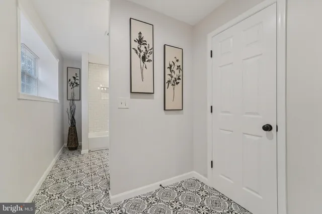 a view of house with yard and lake view