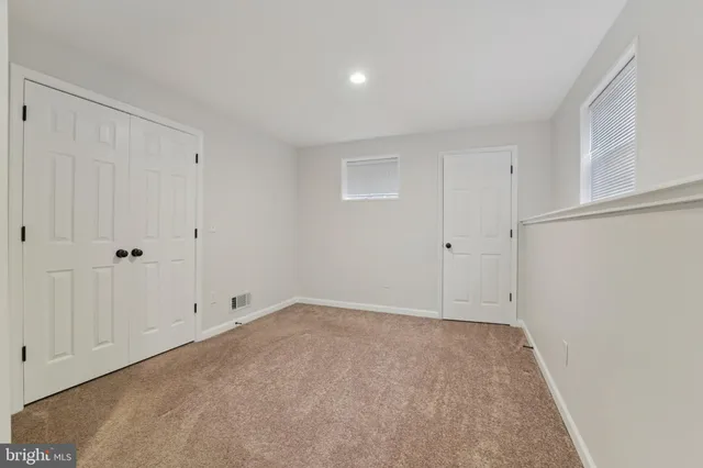 an aerial view of residential house with outdoor space