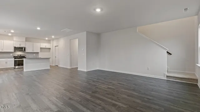 a view of kitchen with wooden floor