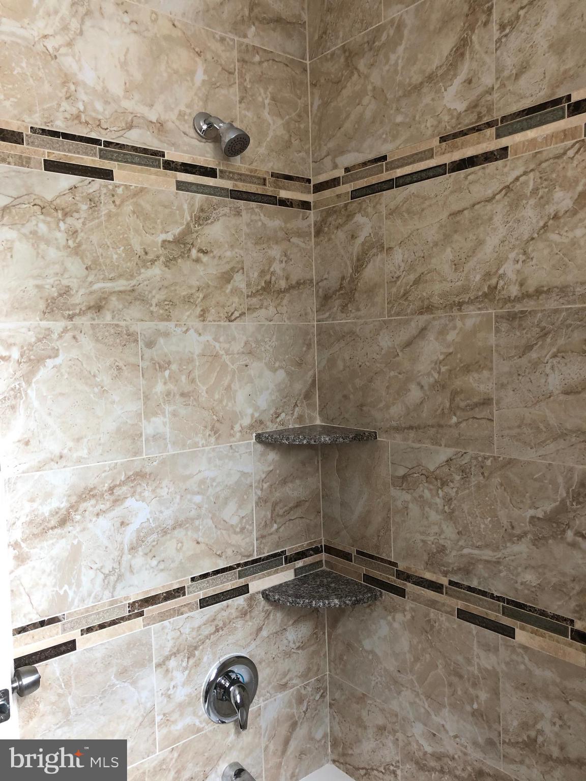 7703 Parkview Road Upper Darby, PA 19082 - Photo 25 of 30 a bathroom with a shower