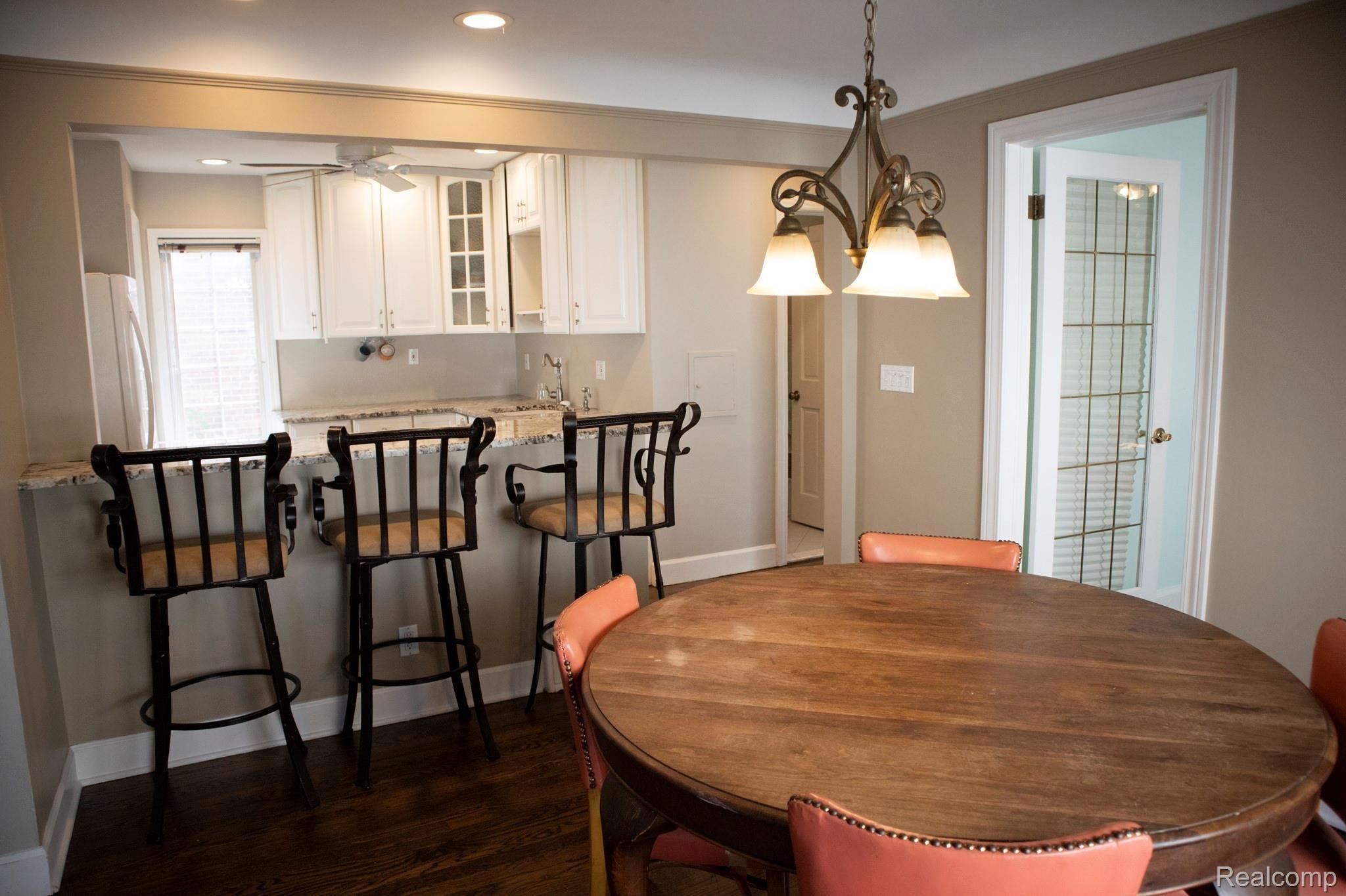 1021 Harvard Road Berkley, MI 48072 - Photo 8 of 42 Open Concept Kitchen and Dining Area with Breakfast Bar