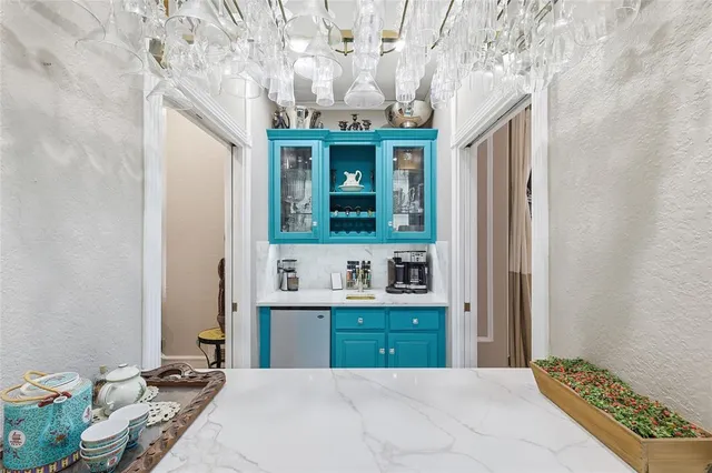 a en suite bathroom with a sink and a mirror