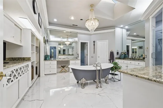 a view of a hallway with wooden floor and windows