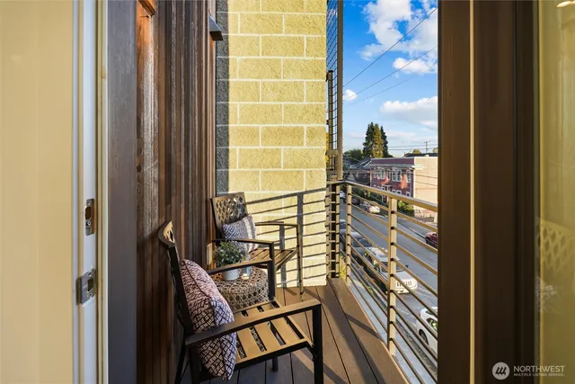 a bedroom with bed and a chandelier