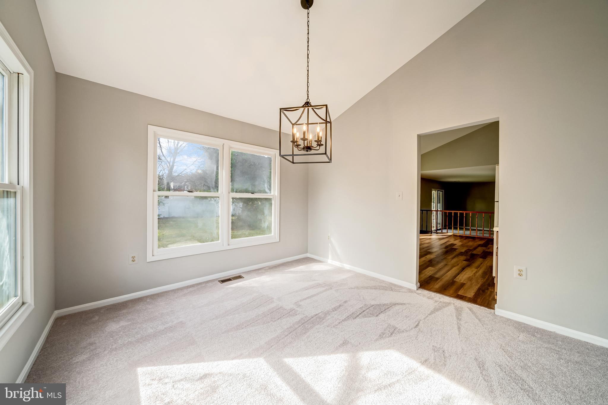 4014 A Ridge Road Annandale, VA 22003 - Photo 11 of 47 DINING ROOM WITH VAULTED CEILING & NEW LIGHT