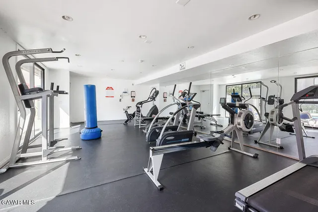a view of a room with gym equipment