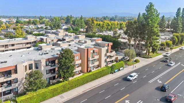 a view of city with tall buildings