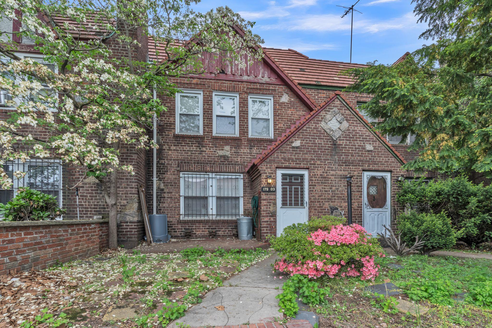 179-03 Selover Road Queens, NY 11434 - Photo 1 of 1 a front view of house with a garden