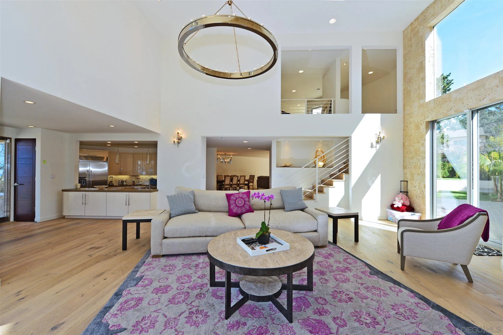 13721 Pine Needles Drive Del Mar, CA 92014 - Photo 10 of 32 a living room with furniture and a large window