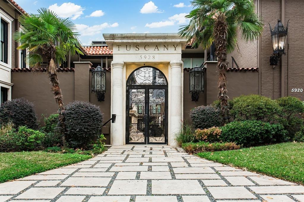 5934 Sandhurst Lane, Unit 207 Dallas, TX 75206 - Photo 29 of 31 Property entrance featuring stucco siding, french doors, and a tile roof