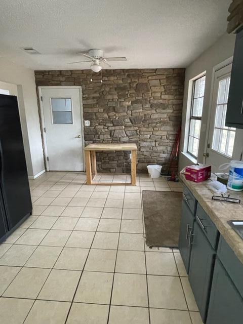 3071 Auburn Road Crestview, FL 32539 - Photo 8 of 21 a living room with stainless steel appliances furniture a rug and a window