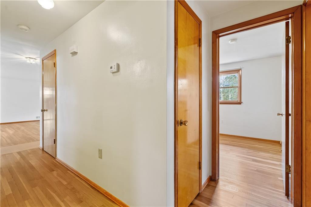 109 Marshall Drive Moon Township, PA 15108 - Photo 14 of 25 a view of a hallway with wooden floor