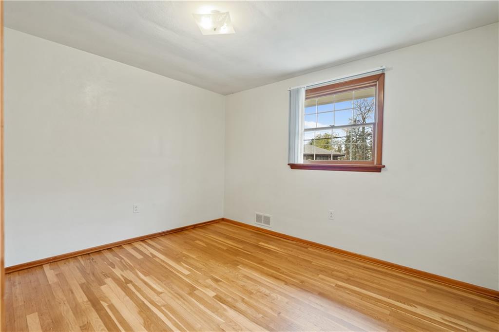 109 Marshall Drive Moon Township, PA 15108 - Photo 16 of 25 a view of an empty room with wooden floor