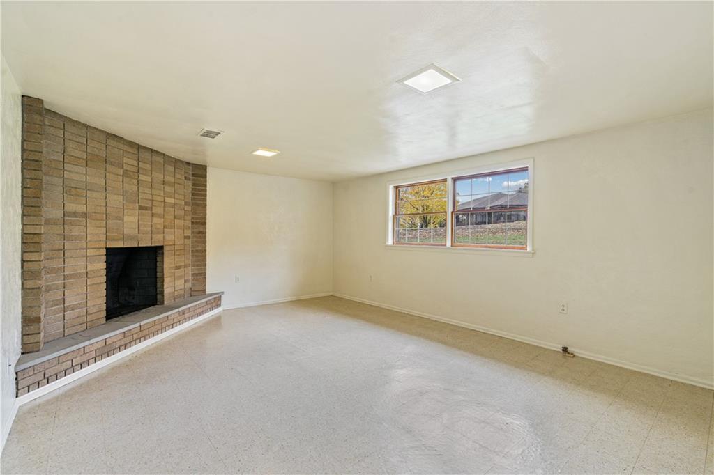 109 Marshall Drive Moon Township, PA 15108 - Photo 19 of 25 a view of an empty room with a fireplace