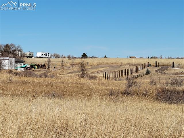 Tbd Wileys Road Peyton, CO 80831 - Photo 9 of 12 From the lot looking towards Wileys Rd entrance