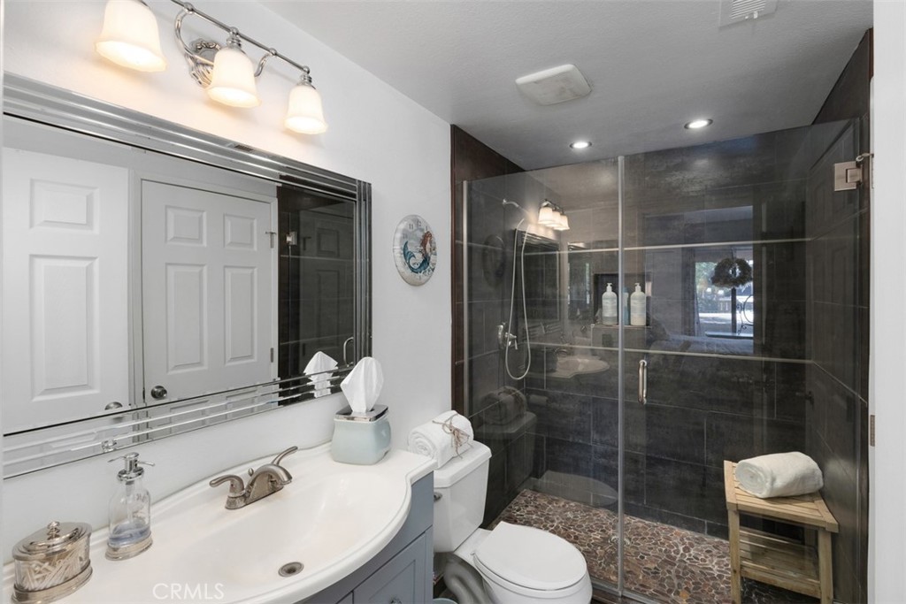 2713 Quail Ridge Circle, Unit 25 Fullerton, CA 92835 - Photo 11 of 30 a bathroom with a sink toilet and shower