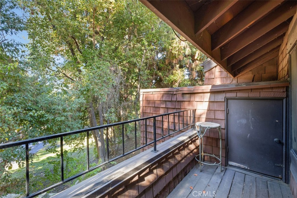 2713 Quail Ridge Circle, Unit 25 Fullerton, CA 92835 - Photo 18 of 30 a view of balcony with wooden floor