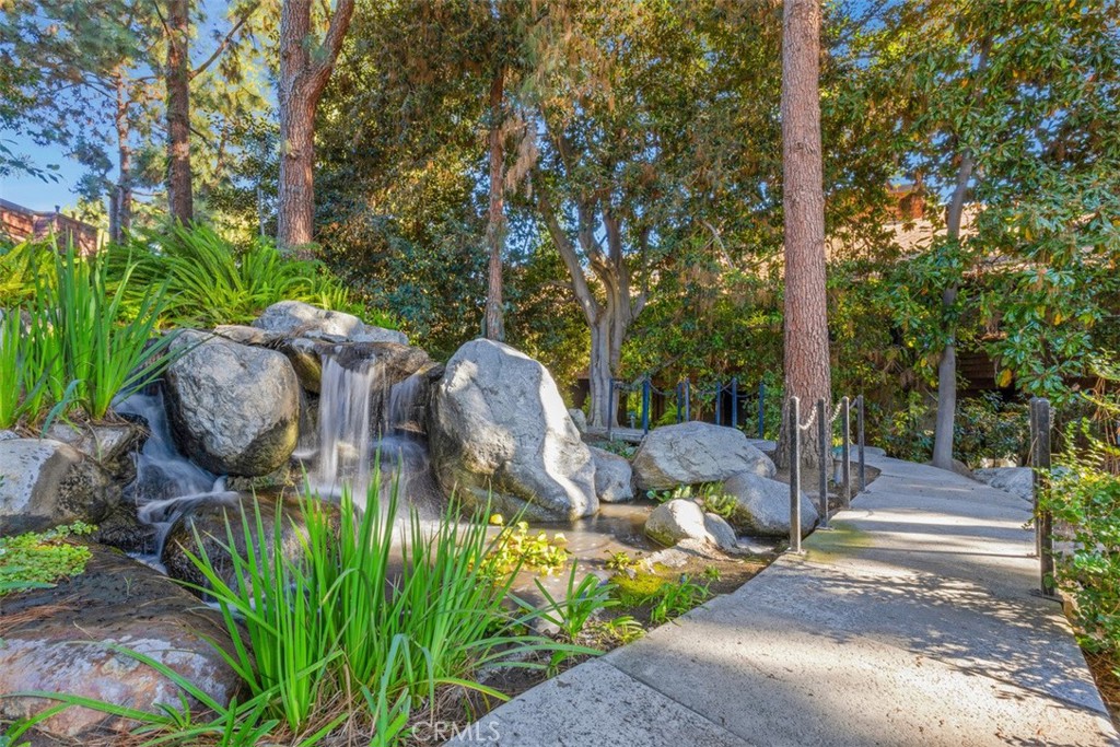2713 Quail Ridge Circle, Unit 25 Fullerton, CA 92835 - Photo 20 of 30 a view of yard with green space and seating area