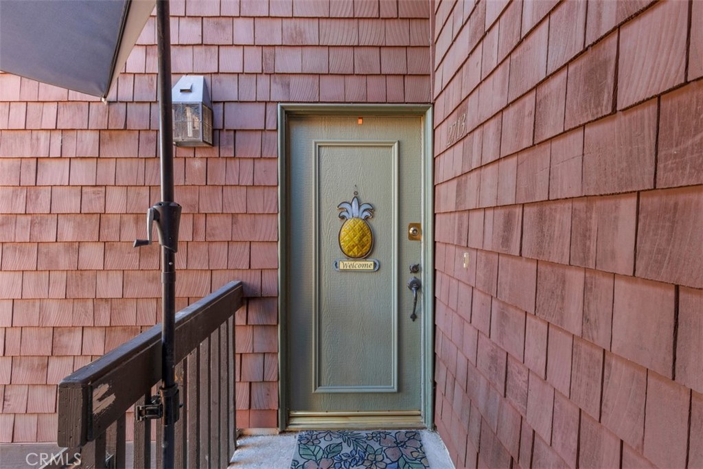 2713 Quail Ridge Circle, Unit 25 Fullerton, CA 92835 - Photo 2 of 30 a view of a brick house with wooden fence