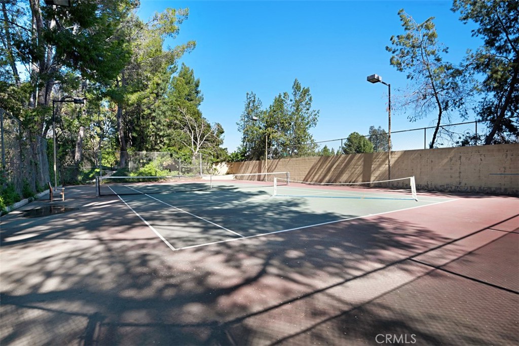 2713 Quail Ridge Circle, Unit 25 Fullerton, CA 92835 - Photo 23 of 30 a view of a yard with plants and trees