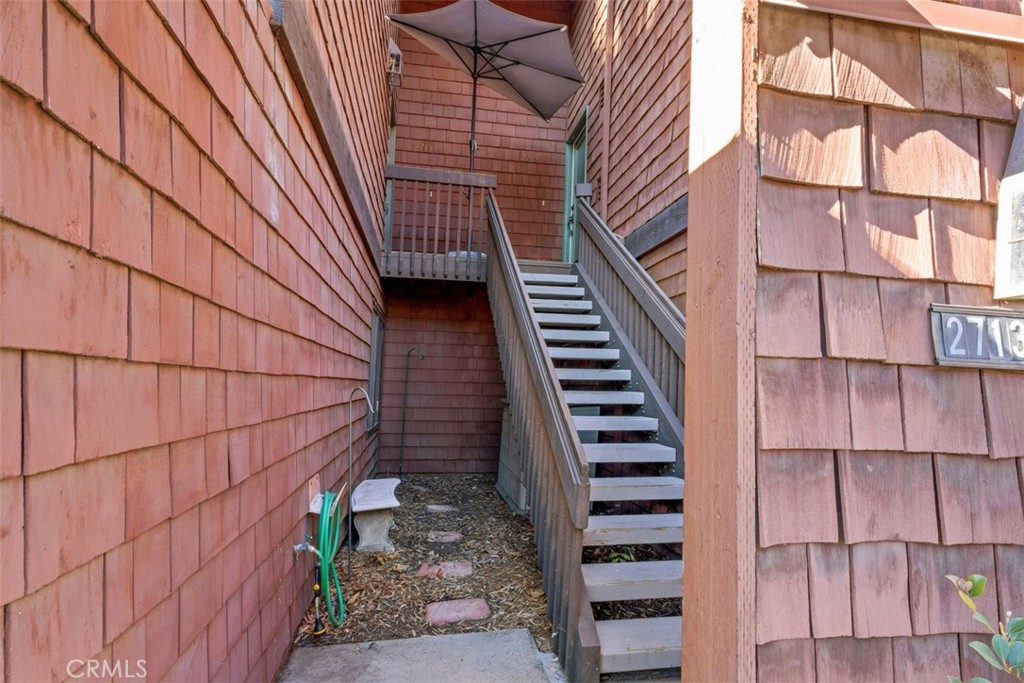 2713 Quail Ridge Circle, Unit 25 Fullerton, CA 92835 - Photo 30 of 30 a view of entryway with a wooden door
