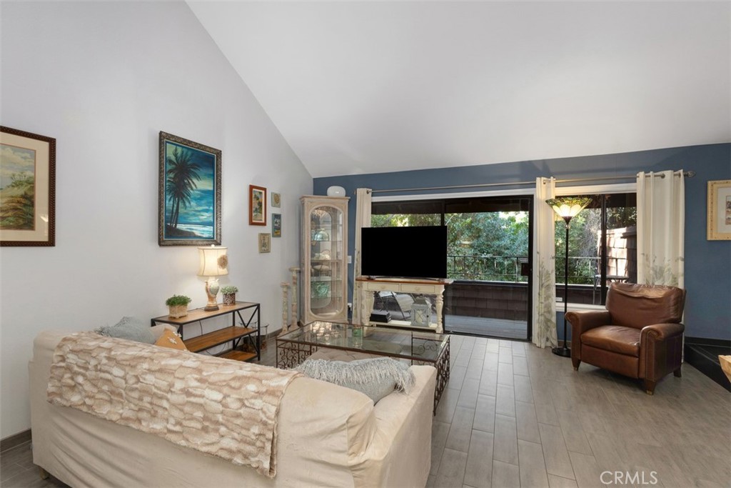 2713 Quail Ridge Circle, Unit 25 Fullerton, CA 92835 - Photo 5 of 30 a living room with furniture and a flat screen tv