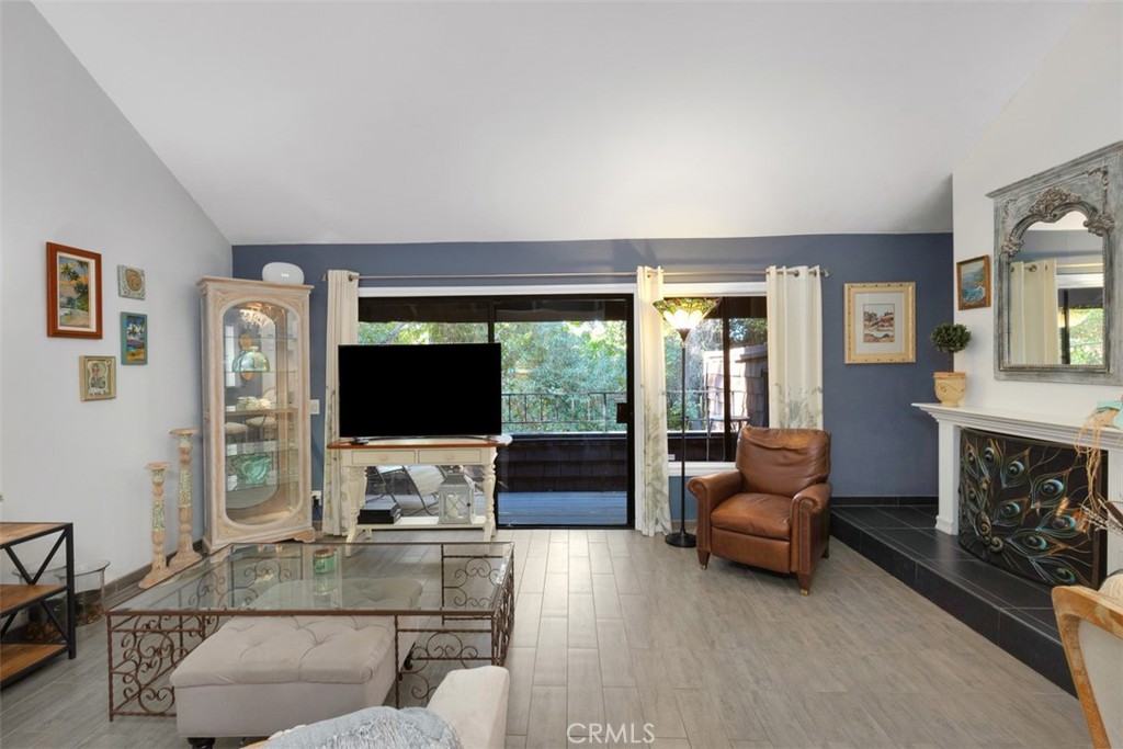 2713 Quail Ridge Circle, Unit 25 Fullerton, CA 92835 - Photo 7 of 30 a living room with furniture and a flat screen tv