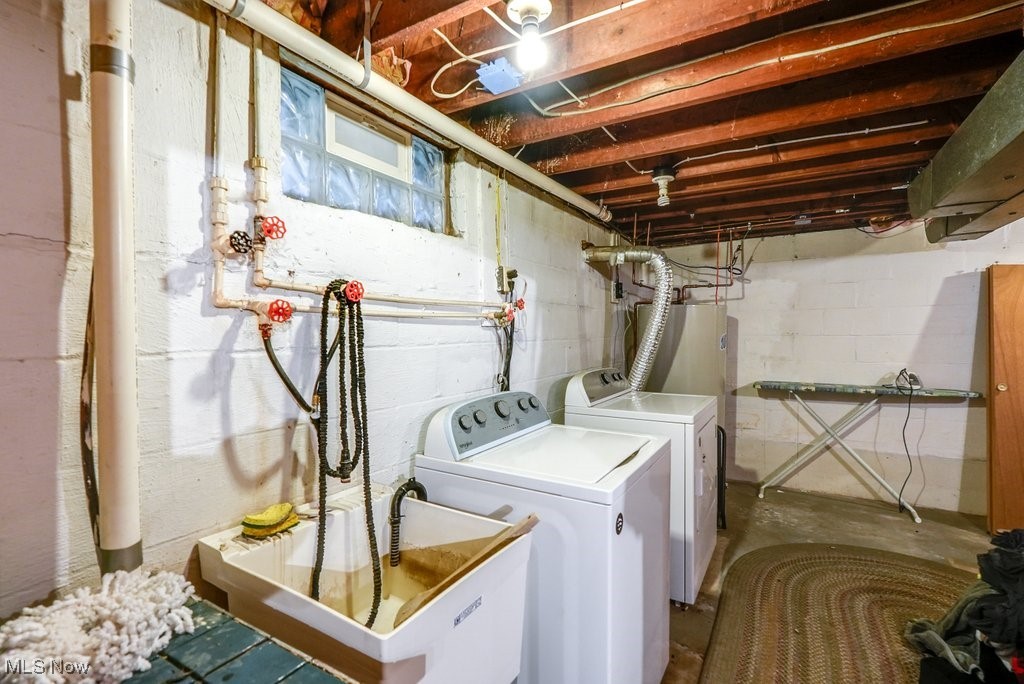 3204 Old Forge Road Kent, OH 44240 - Photo 38 of 42 Laundry room with sink and washing machine and clothes dryer