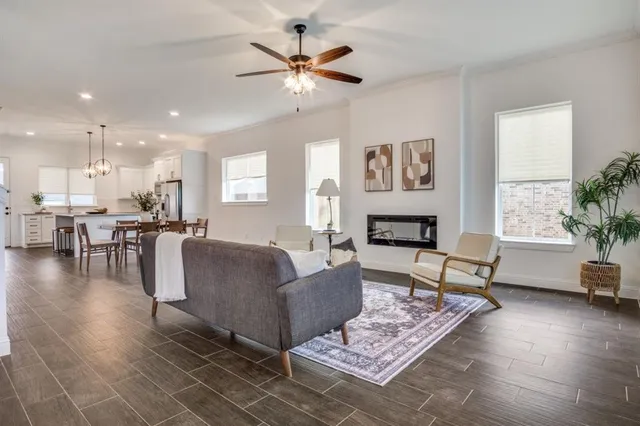 a living room with furniture and a table