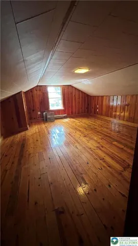 a view of a livingroom with wooden floor