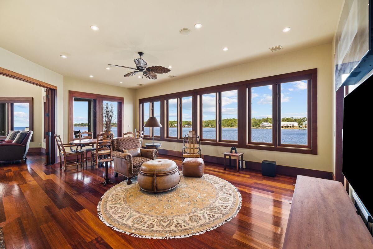 281 Grove Lane Freeport, FL 32439 - Photo 11 of 36 a living room with furniture and a large window