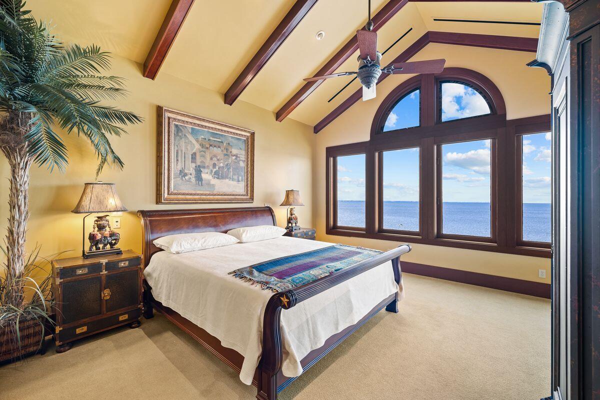 281 Grove Lane Freeport, FL 32439 - Photo 20 of 36 a bedroom with a bed and a window