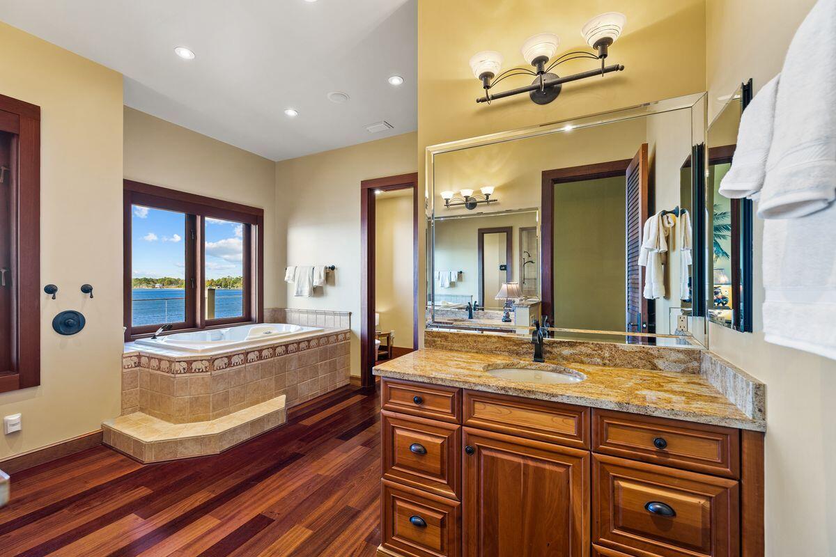281 Grove Lane Freeport, FL 32439 - Photo 22 of 36 a view of living room with granite countertop furniture and fireplace