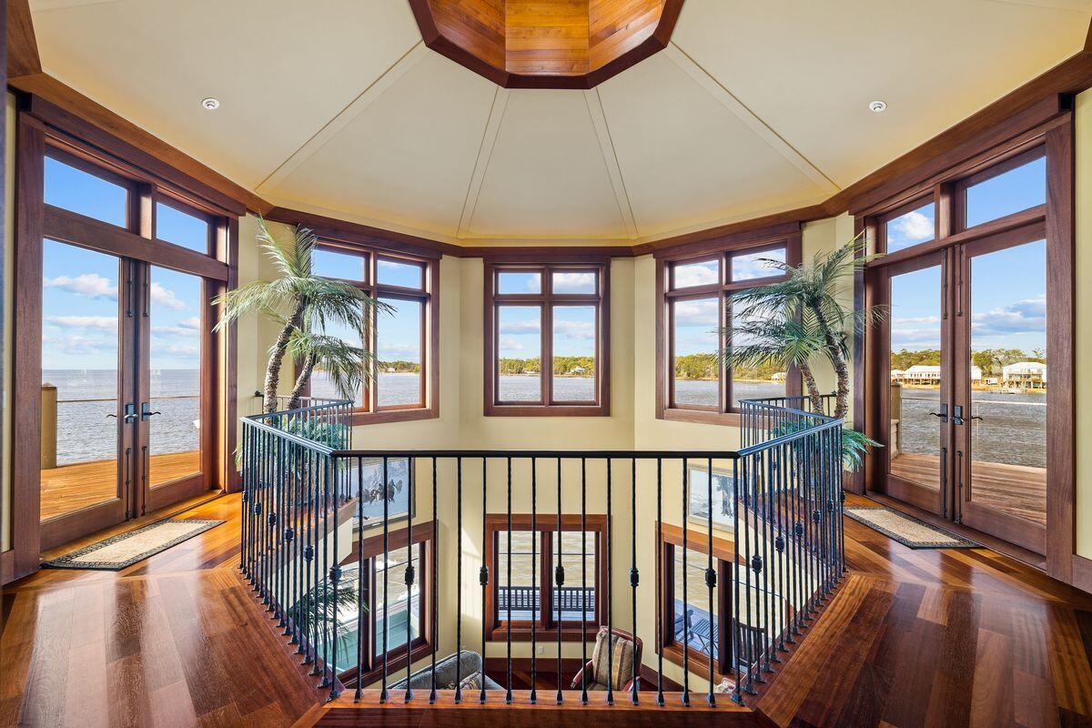 281 Grove Lane Freeport, FL 32439 - Photo 24 of 36 a view of staircase with a porch