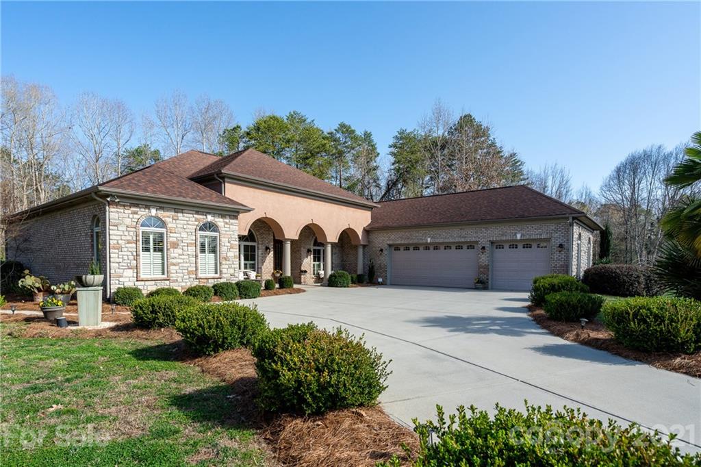 2341 Valelake Road York, SC 29745 - Photo 2 of 48 a front view of a house with garden