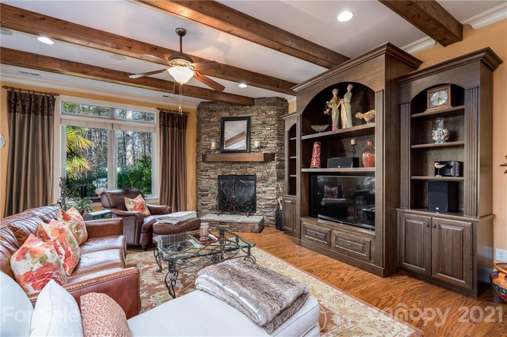 2341 Valelake Road York, SC 29745 - Photo 18 of 48 a living room with furniture a fireplace and a large window