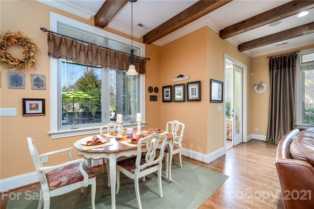 2341 Valelake Road York, SC 29745 - Photo 20 of 48 a dining room with furniture a chandelier and wooden floor