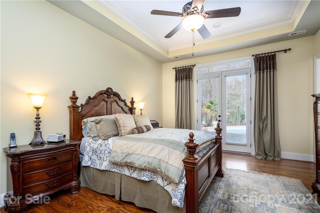 2341 Valelake Road York, SC 29745 - Photo 22 of 48 a bedroom with a bed and wooden floor