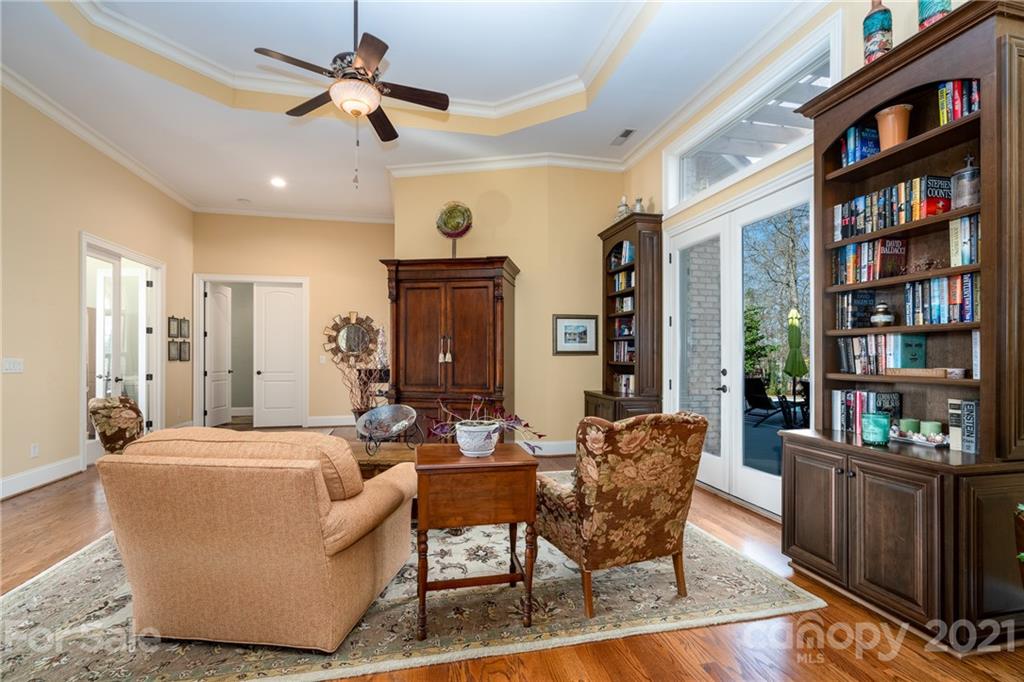 2341 Valelake Road York, SC 29745 - Photo 9 of 48 a living room with fireplace furniture and a book shelf