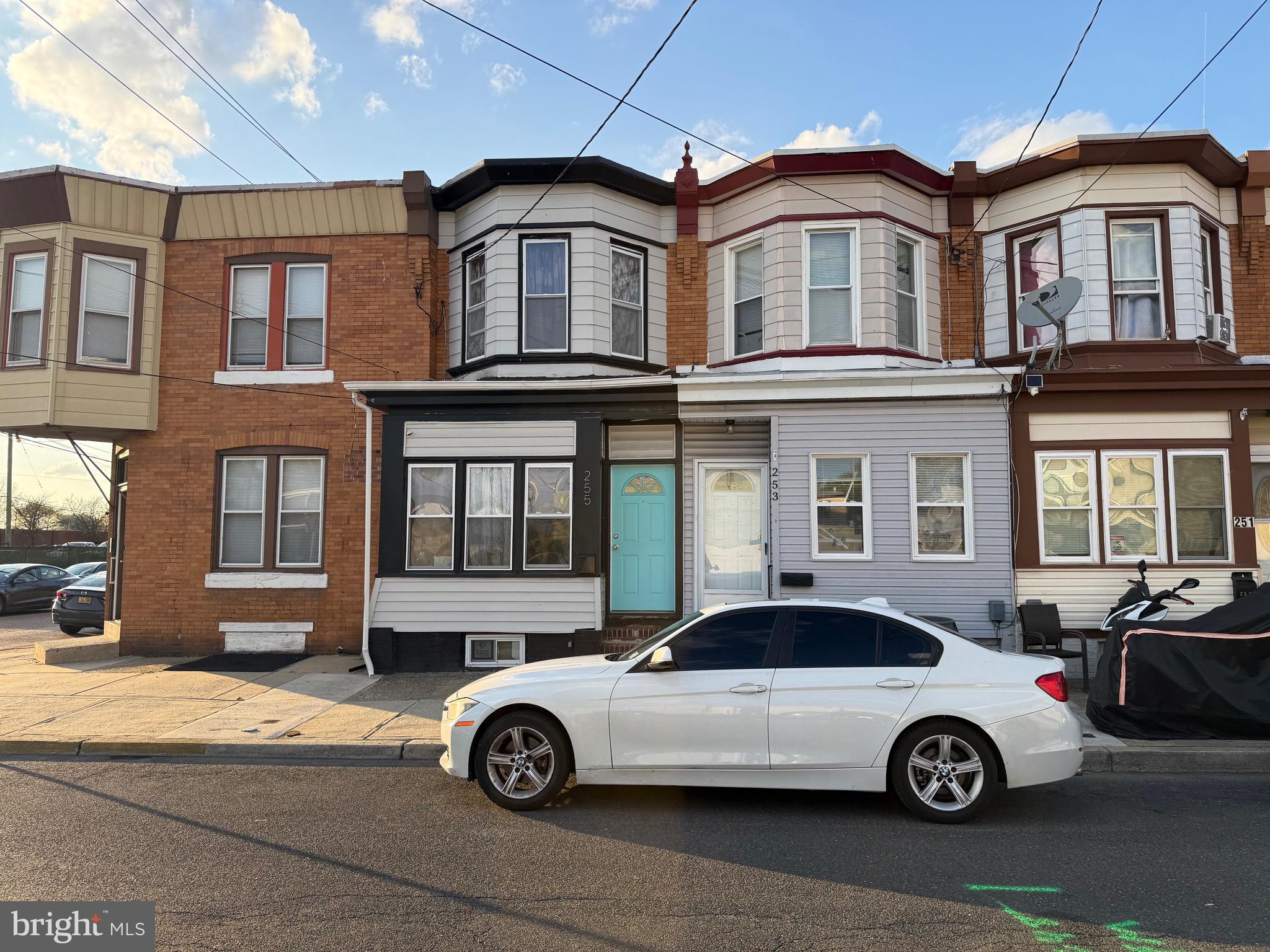 a car parked in front of a house