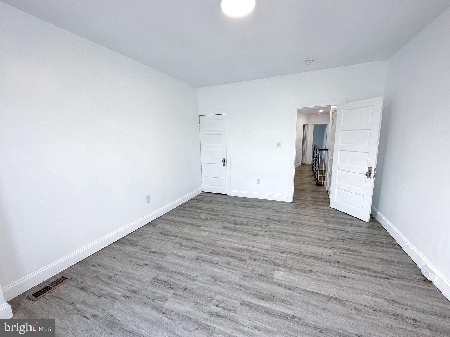 255 3rd Street Gloucester City, NJ 08030 - Photo 16 of 35 a view of a room with wooden floor