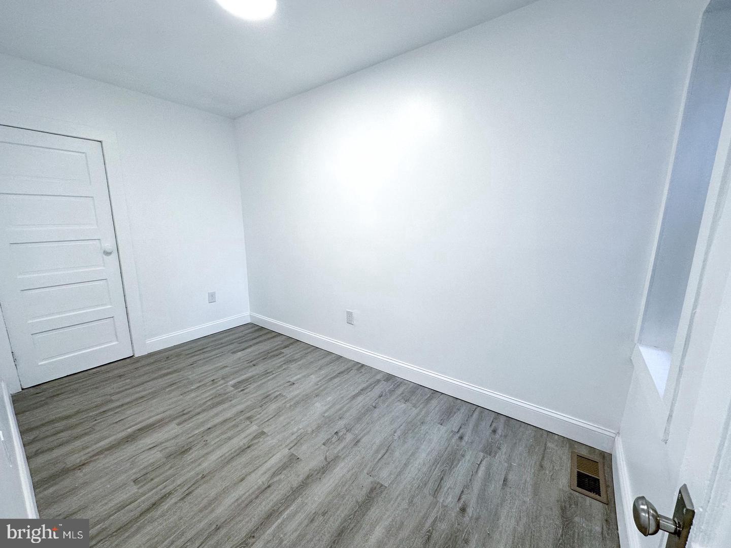 255 3rd Street Gloucester City, NJ 08030 - Photo 17 of 35 a view of a room with wooden floor