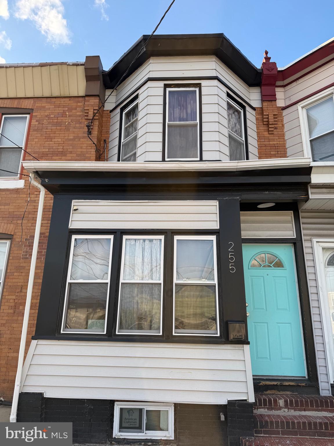 255 3rd Street Gloucester City, NJ 08030 - Photo 2 of 35 a front view of a house with a window