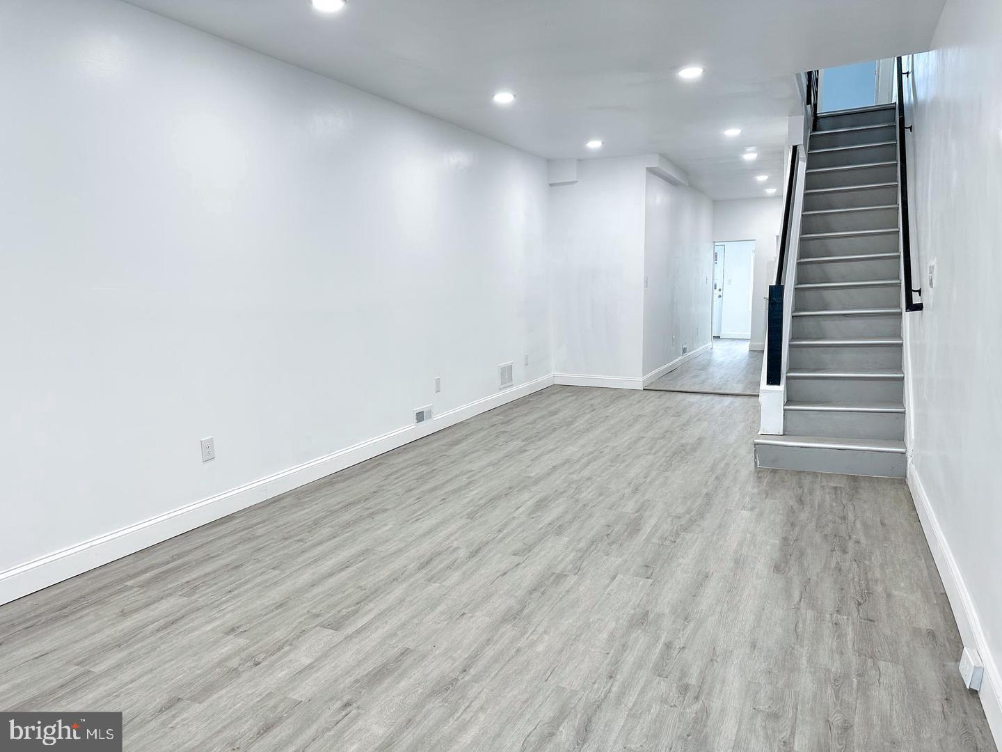 255 3rd Street Gloucester City, NJ 08030 - Photo 27 of 35 an empty room with wooden floor