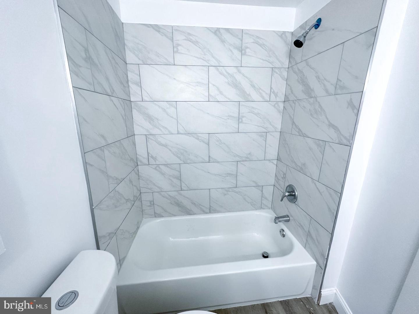 255 3rd Street Gloucester City, NJ 08030 - Photo 35 of 35 a bathroom with a tub and a toilet