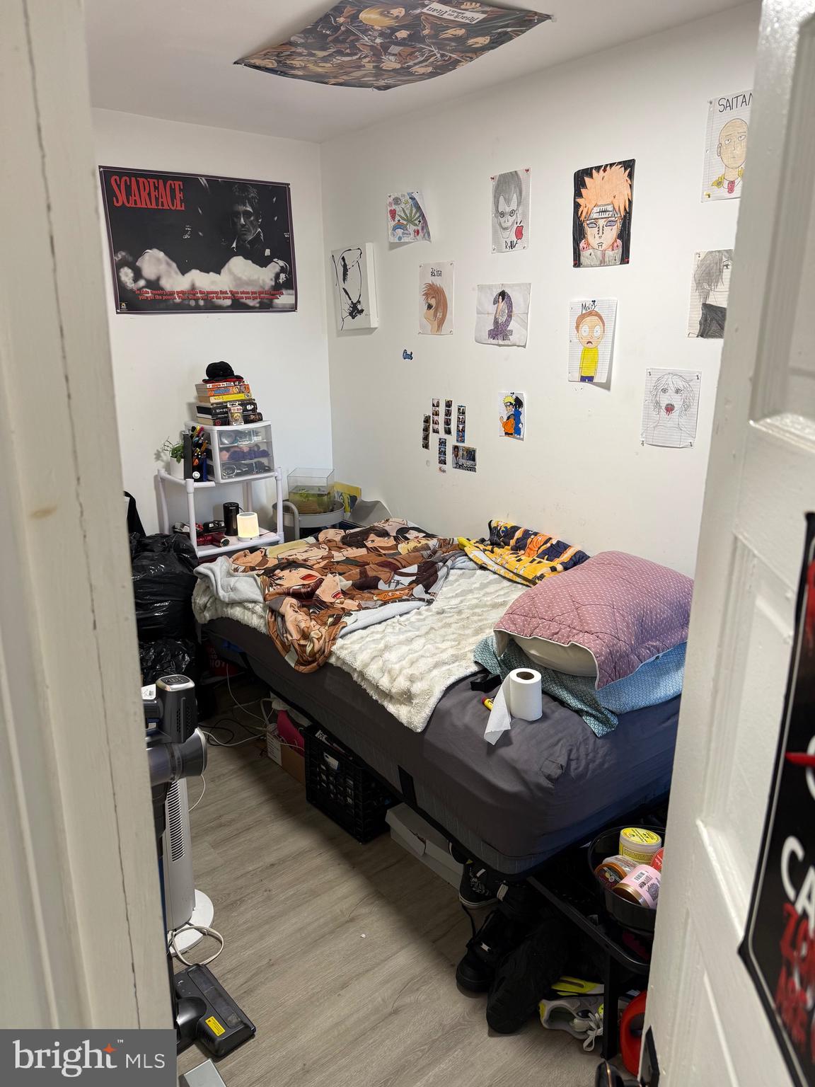 255 3rd Street Gloucester City, NJ 08030 - Photo 6 of 35 a room with a bed and furniture