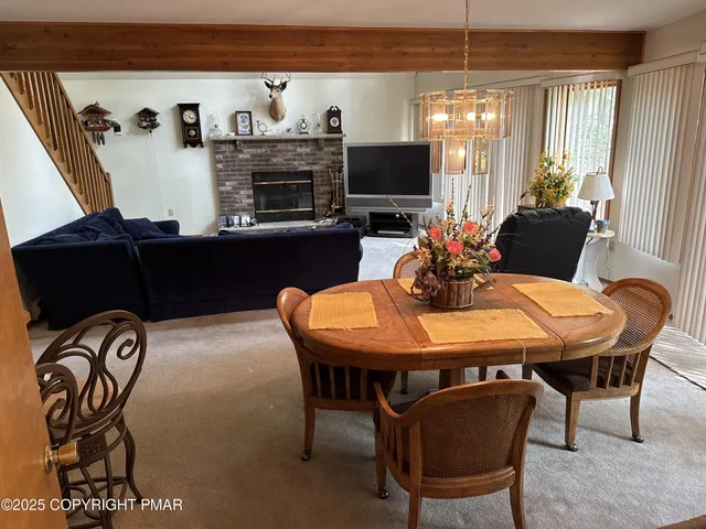 a view of a dining room with furniture